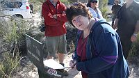 07-Carol signs the Visitors Book at Milmed Rock